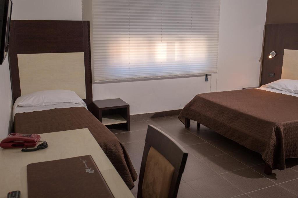 Standard Quadruple room Pansini Hotel Residence