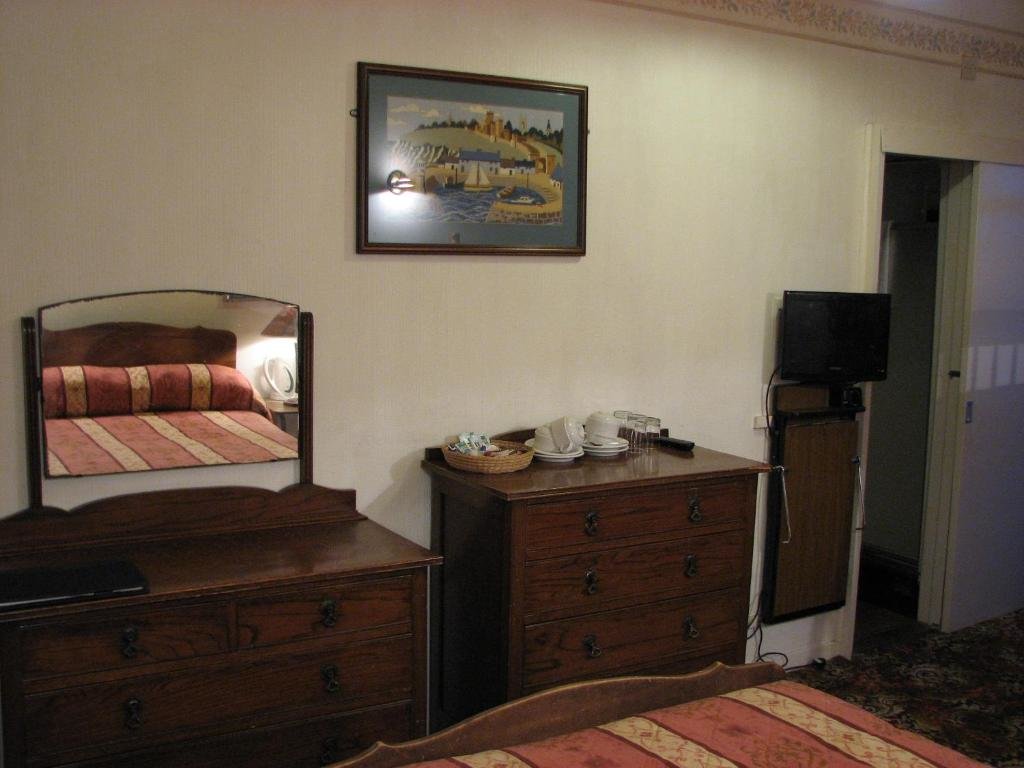 Standard quadruple chambre Vue mer Lancaster Hotel