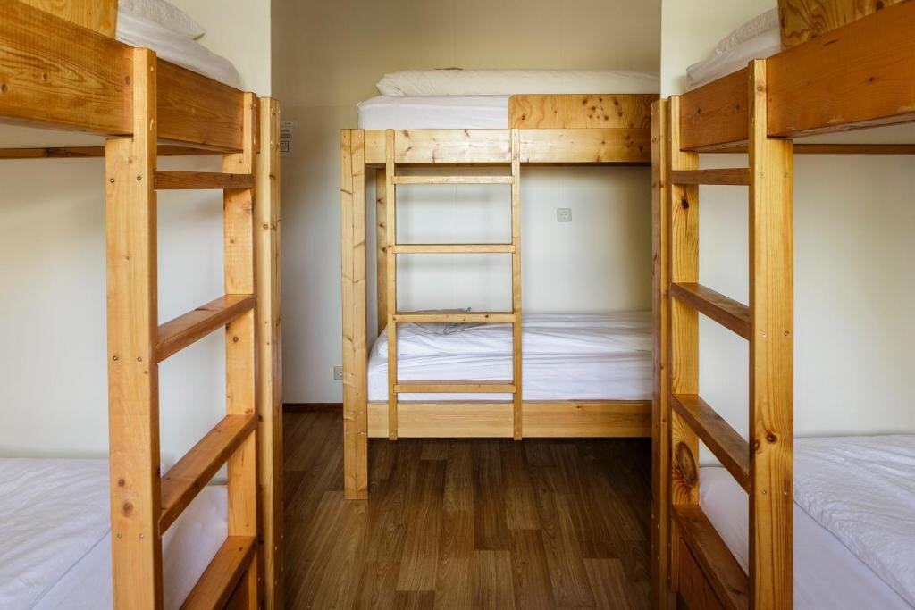 Кровать в общем номере South Central Guesthouse