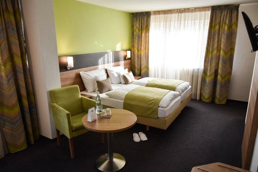 Supérieure double chambre avec balcon Martins Klause Airport Messe Hotel - air conditioning - self-check-in available