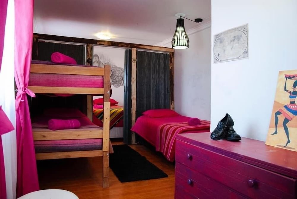 Cama en dormitorio compartido Ecoluna Lodge