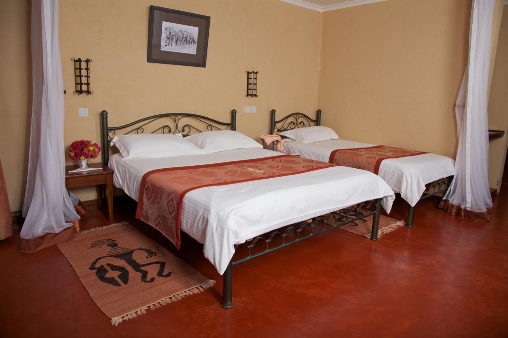 Deluxe Dreier Zimmer Ashnil Aruba Lodge