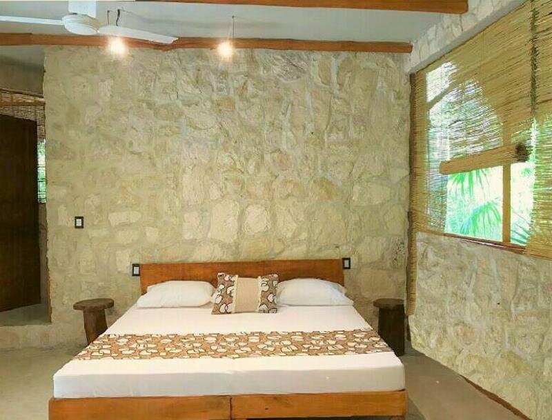 Standard Quadruple room with balcony Aldea Maya-Ha Cabañas con cenotes