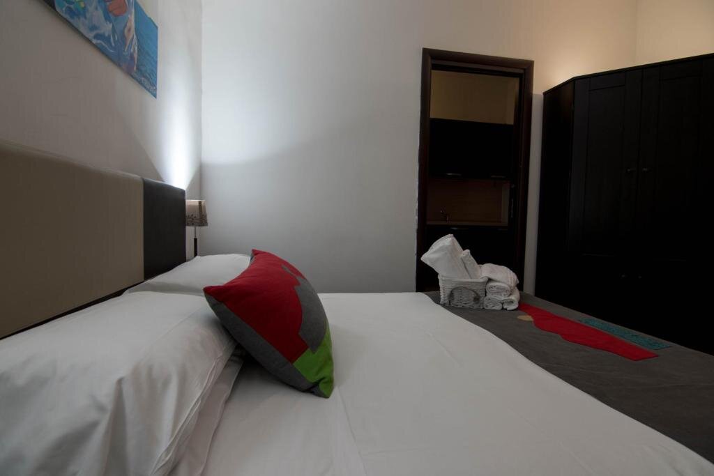 Comfort Quadruple room Hotel Plebiscito Aparthotel