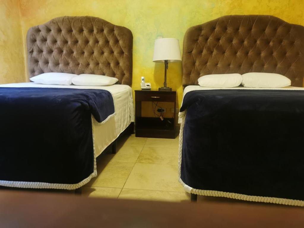 Standard Dreier Zimmer Hotel Antigua Inn