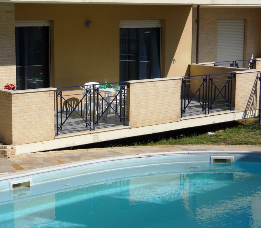 Апартаменты Standard Appartamento con piscina Green Bay Village