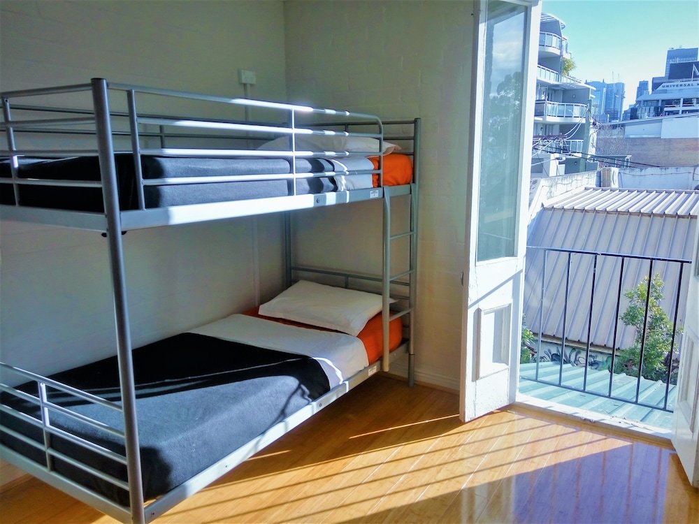 Cama en dormitorio compartido Asylum Sydney Backpackers Hostel