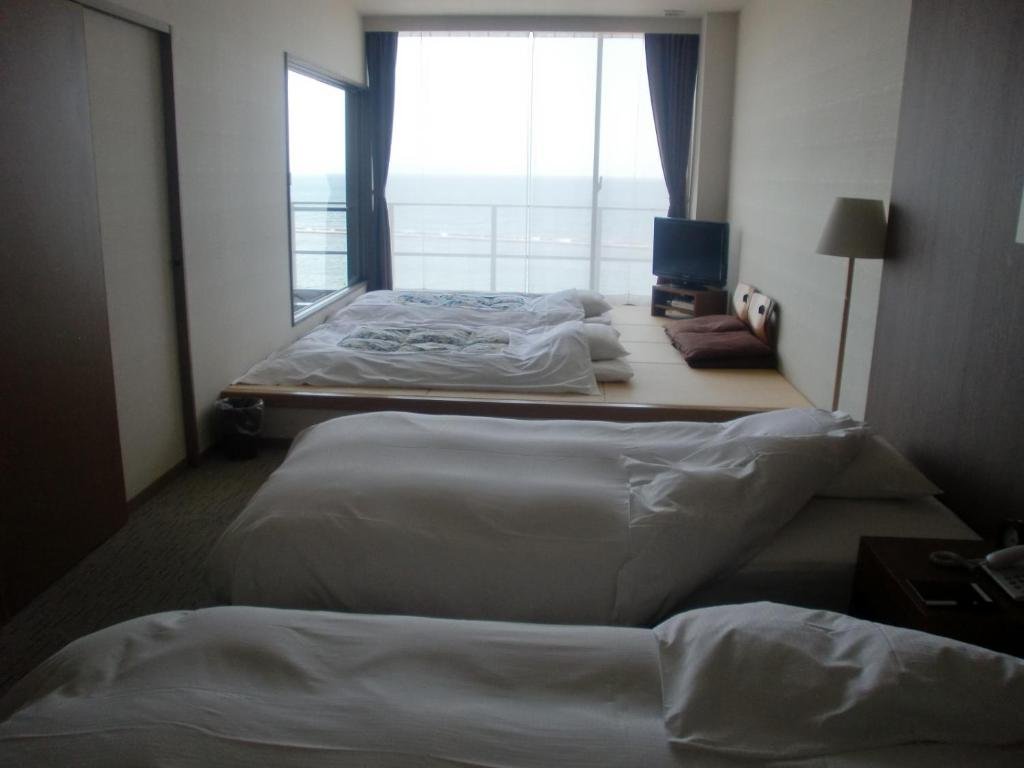 Standard quadruple chambre Vue mer Bayside Square Kaike Hotel