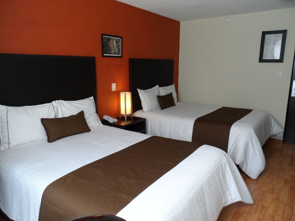 Standard quadruple chambre Hotel Plaza Morelos
