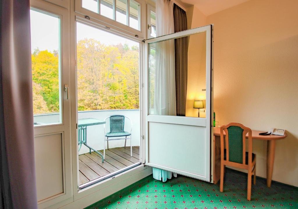 Habitación doble Confort con balcón y con vista al jardín Ferien Hotel Südharz