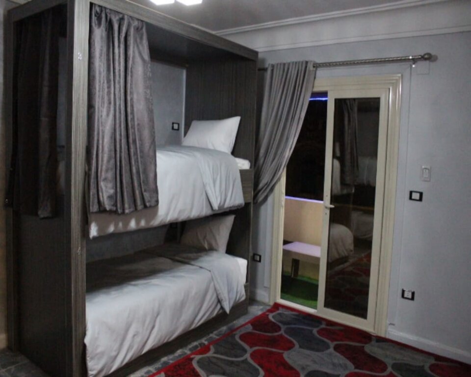 Кровать в общем номере Sunset Hotel Cairo - Hostel