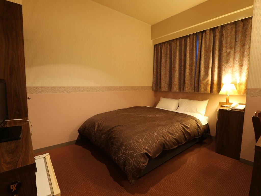 Standard Einzel Zimmer L and L Hotel Senryu