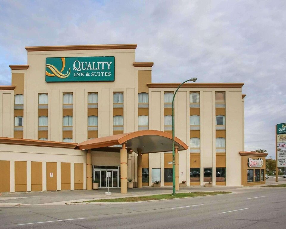 Кровать в общем номере Quality Inn & Suites Winnipeg