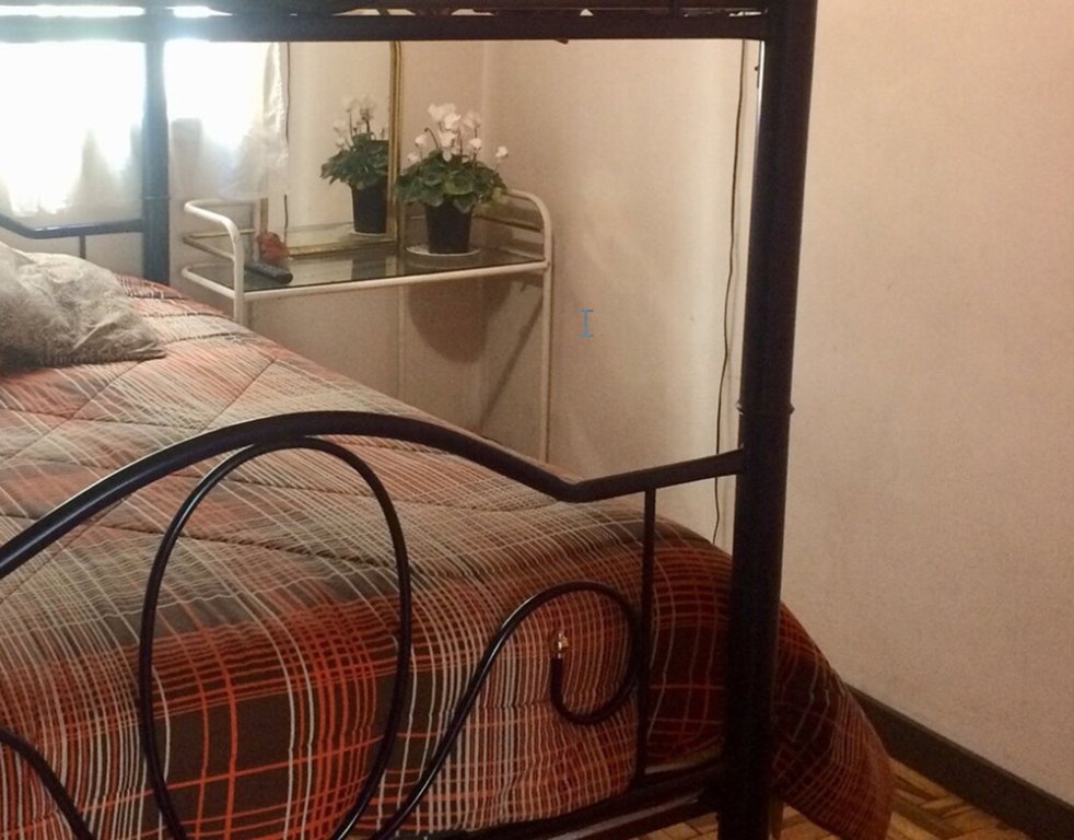 Bett im Wohnheim Quito Family And Youth Hostel