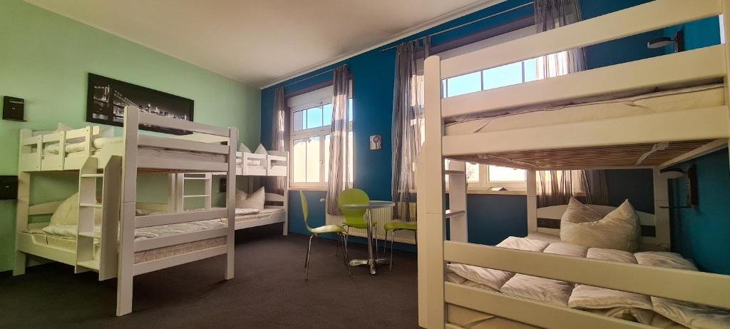 Кровать в общем номере Harz Hostel
