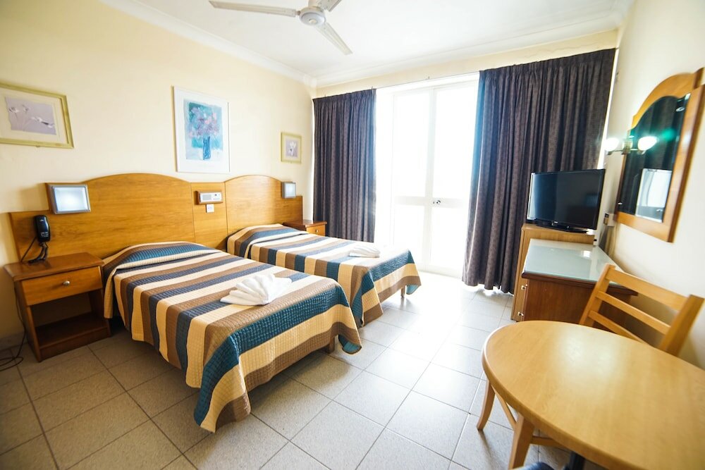 Standard Triple room with balcony Coral Hotel