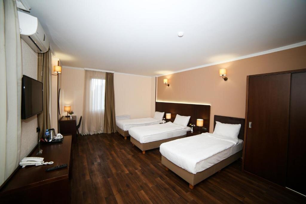 Standard Dreier Zimmer mit Stadtblick Hotel Corner Inn