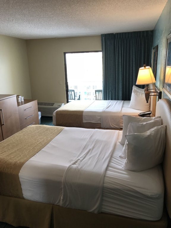 Standard Quadruple room with balcony and with view Days Inn by Wyndham Daytona Oceanfront