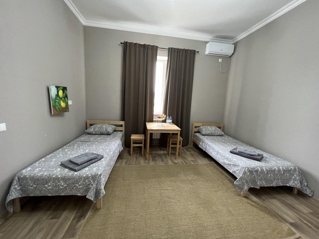 Кровать в общем номере Гостевой Отель-125