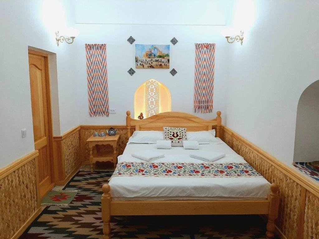 Standard double chambre madrasah Polvon-Qori boutique hotel