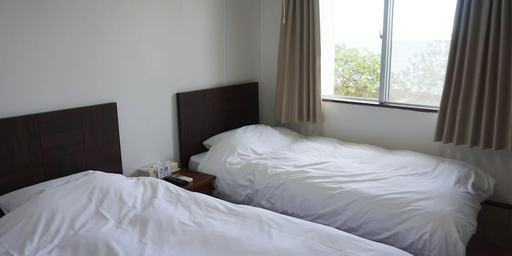 Standard Doppel Zimmer mit Balkon und mit Meerblick Hotel Oceans Nakijin