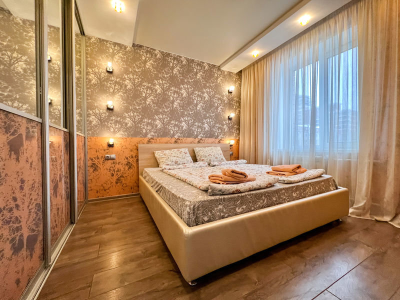 Кровать в общем номере с 2 комнатами Апартаменты Ютрип на ул. Чистопольская, д. 22