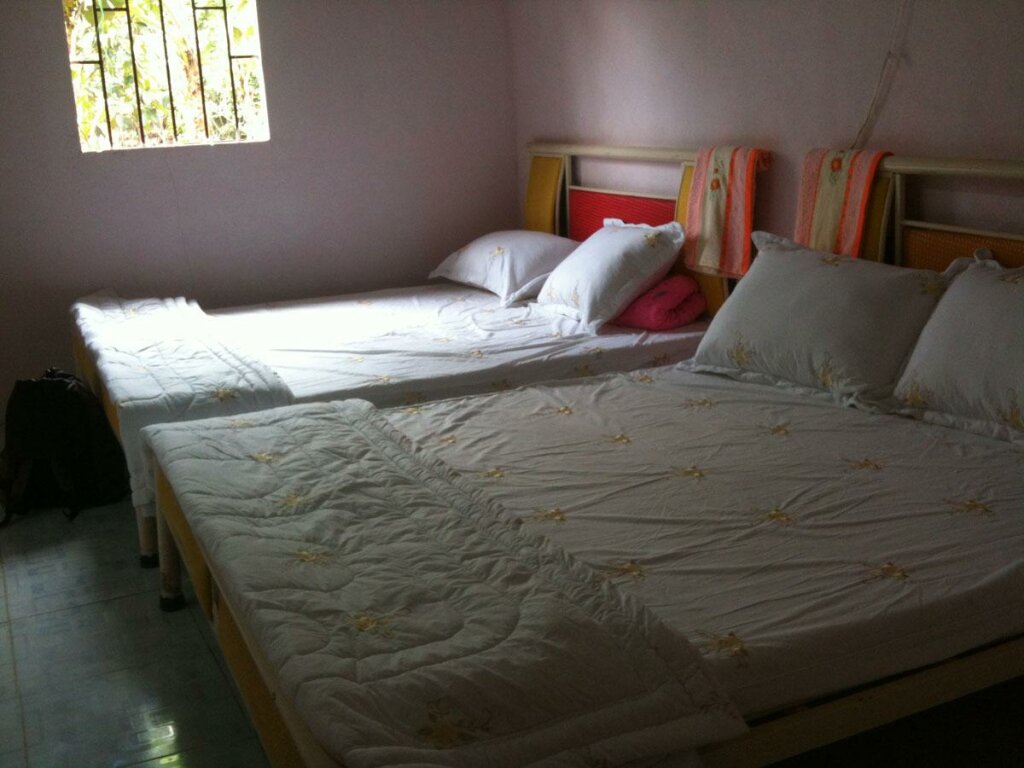Кровать в общем номере My Hoa Mekong Homestay
