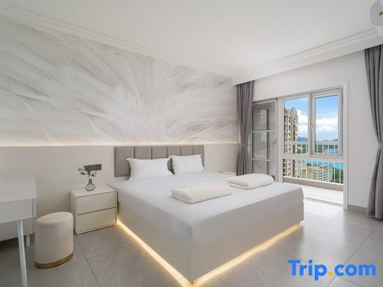 Suite 1 dormitorio con vista al mar Sanya Coconut Sea Time Sea View Holiday Apartment