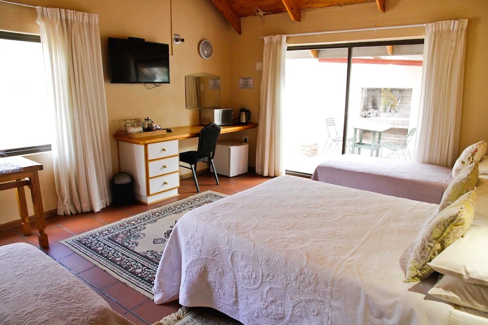 Standard Vierer Familie Zimmer mit Gartenblick Ikaia River Lodge