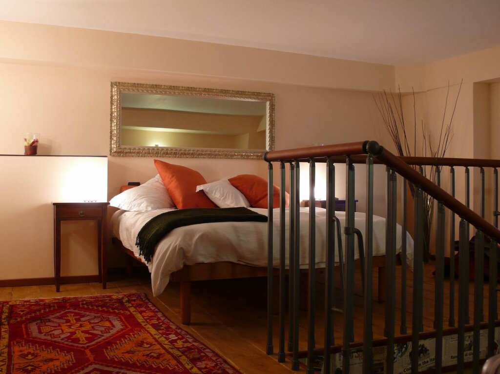 Кровать в общем номере Locanda Delle Corse