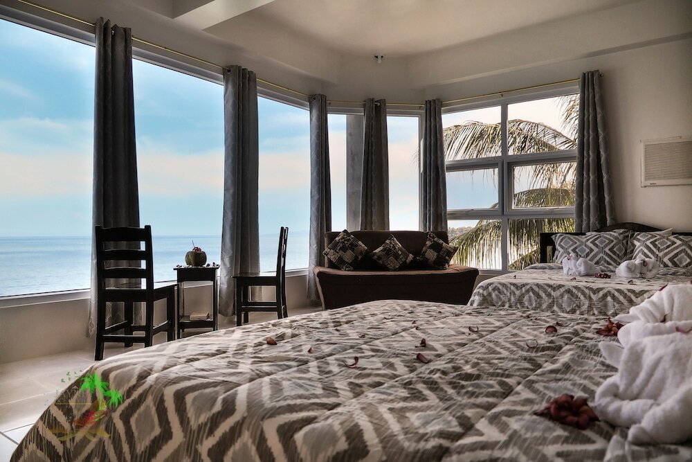 Standard Quadruple Family room with ocean view Jaynet Oceanview Resort