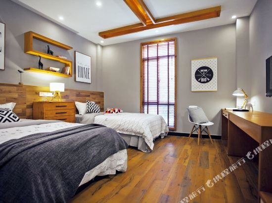 Cama en dormitorio compartido Yuhuayuan Shanjian Design Hotel