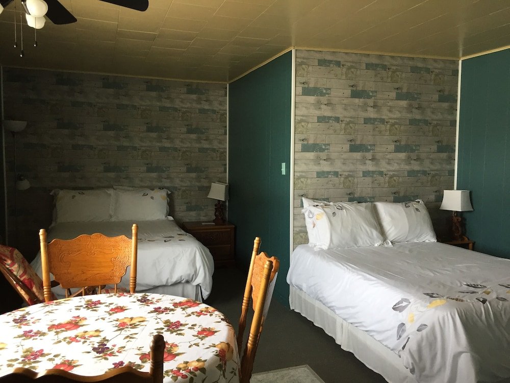 Deluxe quadruple chambre Motel Leblanc
