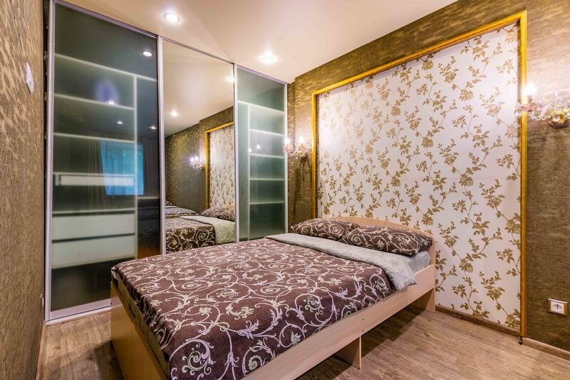 Кровать в общем номере с 2 комнатами Апартаменты DreamHouse Короленко 10