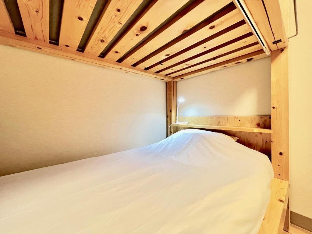 Bett im Wohnheim Glocal Nagoya Backpackers Hostel
