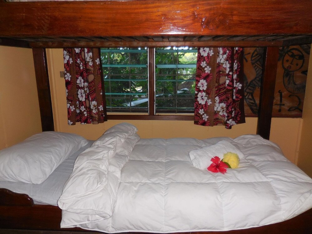 Bett im Wohnheim Treetops Lodge