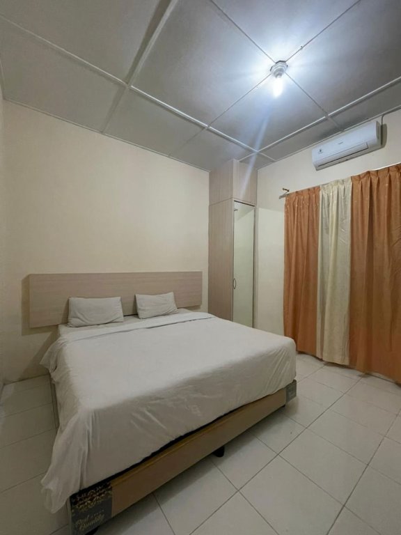 Standard Zimmer OYO 92463 Deli Hotel Medan