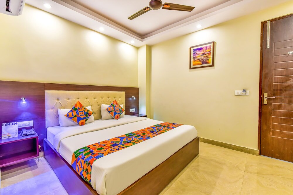 Номер Premium Surya Residency Gms Road by FabHotel