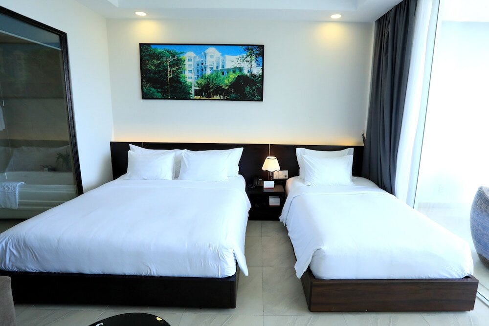 Standard triple famille chambre Orson Hotel & Resort Con Dao