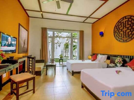 Deluxe Double room with balcony and with garden view Tropical Beach Hoi An Resort