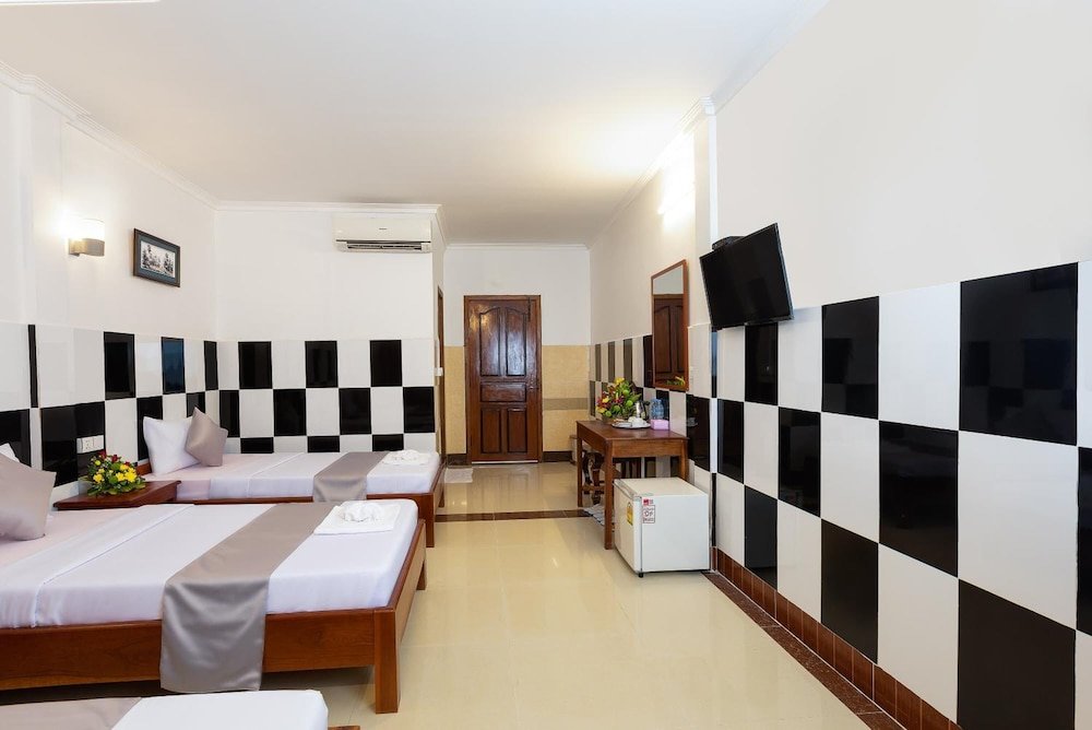Standard triple chambre Botoum Hostel