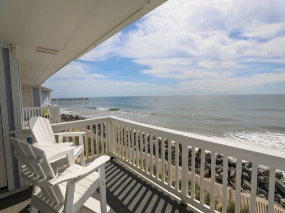 Camera Standard Beach Sunrise - Relaxing and Romantic! Enjoy Ocean Views From the Bedroom With Balcony Access. 1 Condo by Redawning