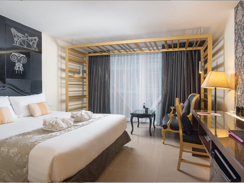 Кровать в общем номере Nimman Mai Design Hotel Chiang Mai - SHA Plus