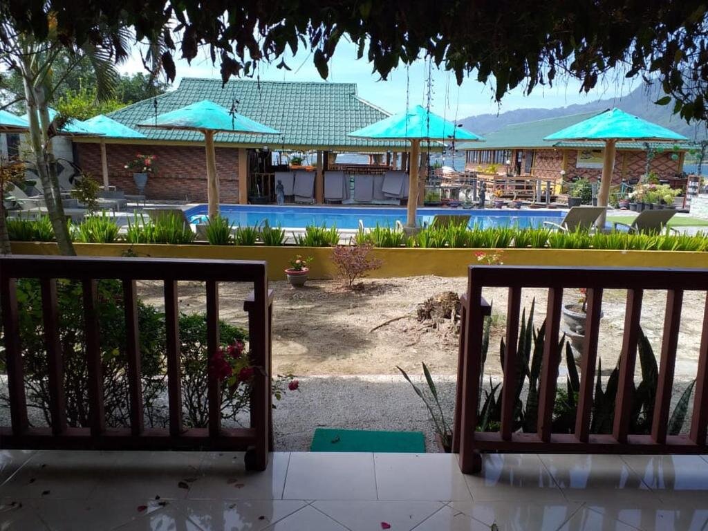 Suite con vista sulla piscina Toba Village Inn