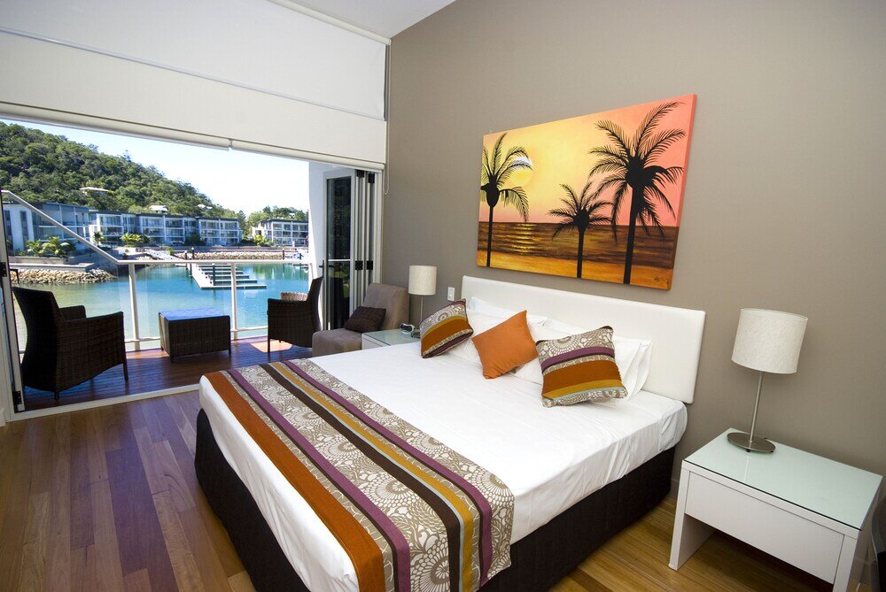 Семейные апартаменты с 3 комнатами с видом на океан Beachside Magnetic Harbour Apartments
