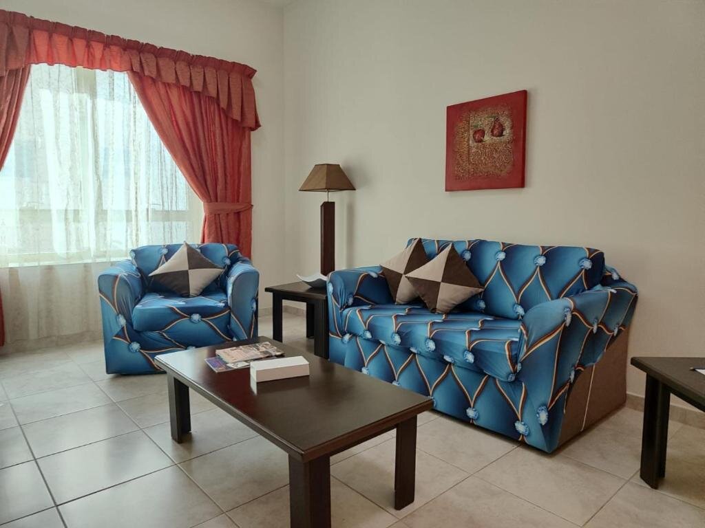 Семейные апартаменты с 2 комнатами с балконом Al Raya Hotel Apartments