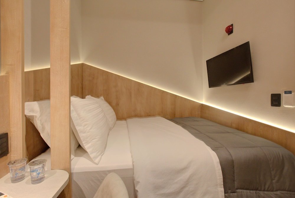 Habitación doble De lujo Fast Sleep Suites by Slaviero Hotéis dentro do Aeroporto Guarulhos Terminal 2, desembarque Oeste