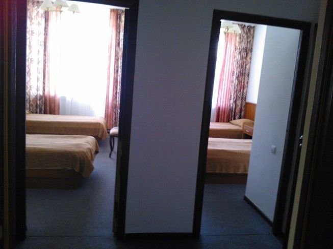Кровать в общем номере Отель Матвеевский