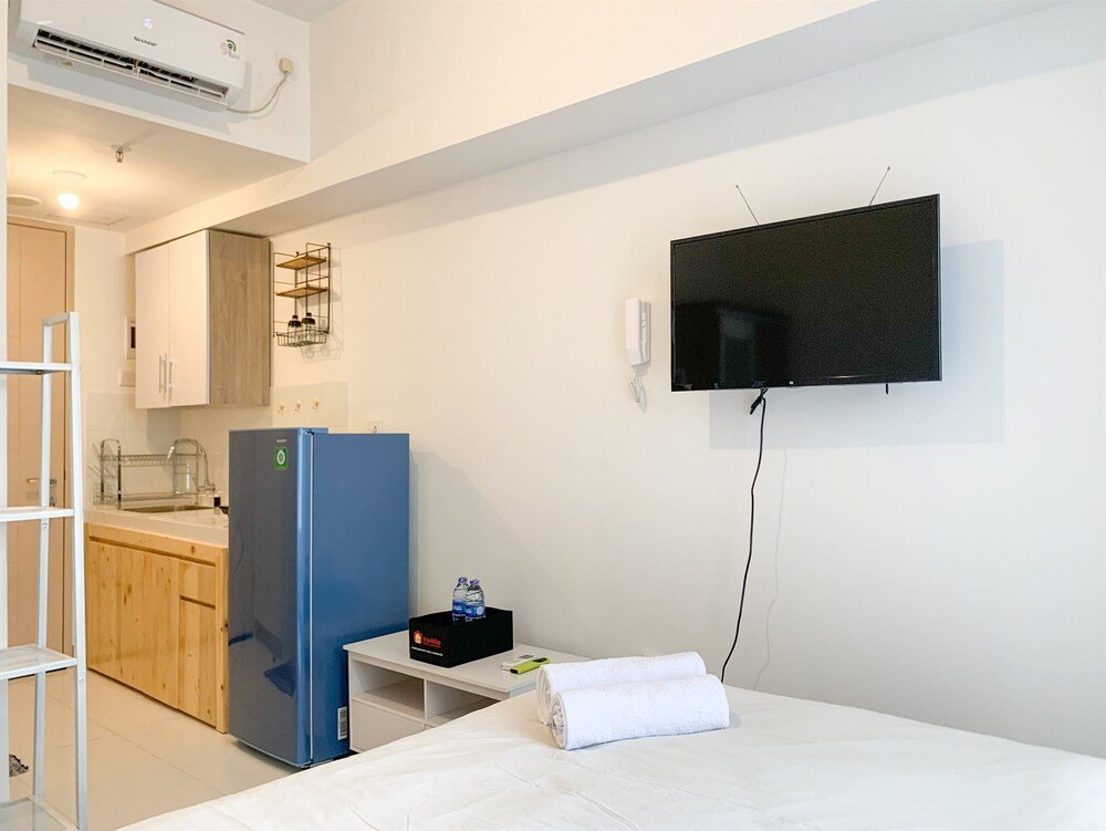 Апартаменты Deluxe Simply Look And Homey Studio At Tokyo Riverside Pik 2 Apartment