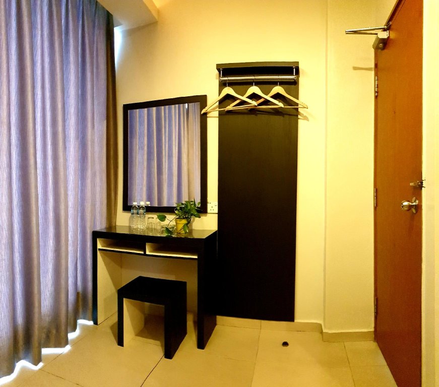 Номер Deluxe Golden Court Hotel - Sri Pelangi